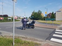 Policjant z motocyklem na Rondzie Śląskim