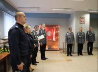 Na zdjęciu  uczestnicy pożegnania zastępcy komendanta powiatowego w Lublińcu.
