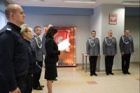Na zdjęciu  uczestnicy pożegnania zastępcy komendanta powiatowego w Lublińcu. Odczytanie rozkazów personalnych.